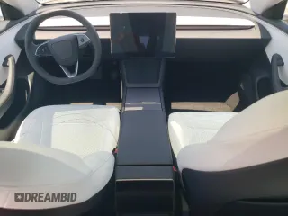 2025 Tesla Model 3 Long Range z VIN 5YJ3E1EA3SF975991, wystawiony jako Copart lot #55629765 z przebiegiem Nie podano mil oraz Szkoda całkowita • Salvage title. Historia ofert i sprzedaży dostępna na DreamBid. Obrazek 8.