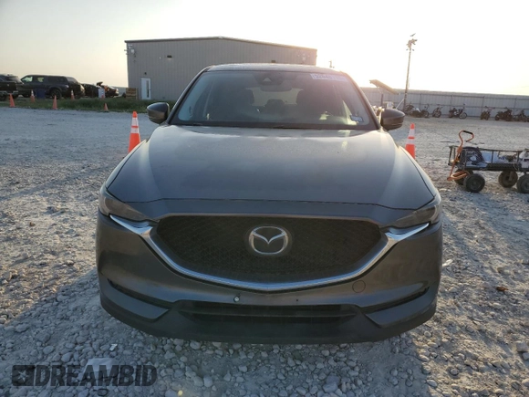 2017 Mazda CX-5 Grand Touring with VIN JM3KFBDL1H0148961, listed as a Copart auction lot 52648115 with 171,767 mi miles and Salvage Title. Bid and sale history available at carsss.com. Image 5.