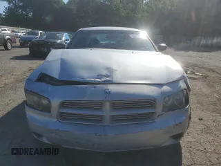 2006 Dodge Charger z VIN 2B3KA43G86H528185, wystawiony jako Copart lot #58007605 z przebiegiem 266 197 mil mil oraz Szkoda całkowita • Salvage title. Historia ofert i sprzedaży dostępna na DreamBid. Obrazek 5.
