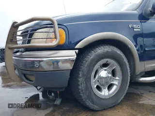 2003 Ford F-150 XLT with VIN 1FTRW07L33KC83234, listed as a IAAI auction lot 41894573 with 215,232 mi miles. Bid and sale history available at carsss.com. Image 17.