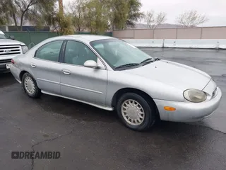 1997 Mercury Sable GS with VIN 1MELM50U8VG603194, listed as a IAAI auction lot 41558010 with 265,169 mi miles. Bid and sale history available at carsss.com. Image 1.