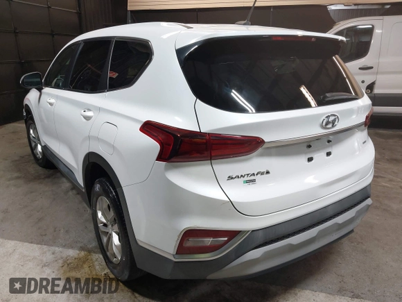 2020 Hyundai Santa Fe SE with VIN 5NMS2CAD8LH163523, listed as a IAAI auction lot 42123756 with 72,992 mi miles and . Bid and sale history available at DreamBid. Image 3.