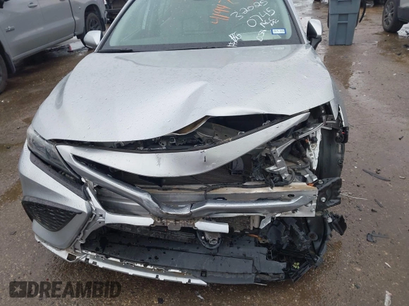 2022 Toyota Camry SE with VIN 4T1G11AKXNU697576, listed as a IAAI auction lot 41947082 with 67,199 mi miles and . Bid and sale history available at DreamBid. Image 6.