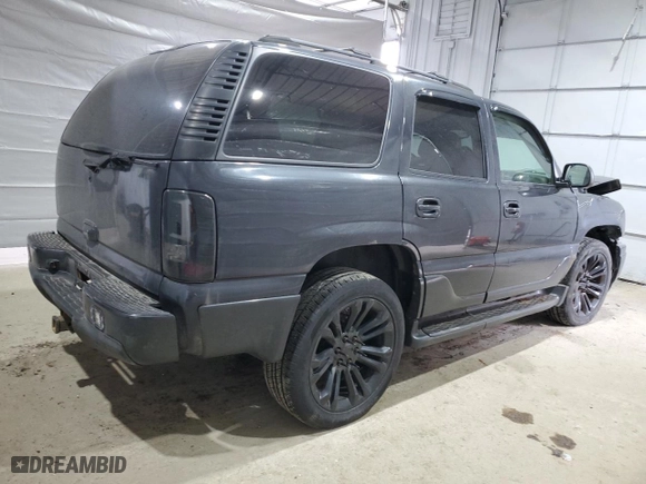 2004 GMC Yukon Denali with VIN 1GKEK63U34J326848, listed as a Copart auction lot 49014285 with 225,388 mi miles and Salvage Title. Bid and sale history available at carsss.com. Image 3.
