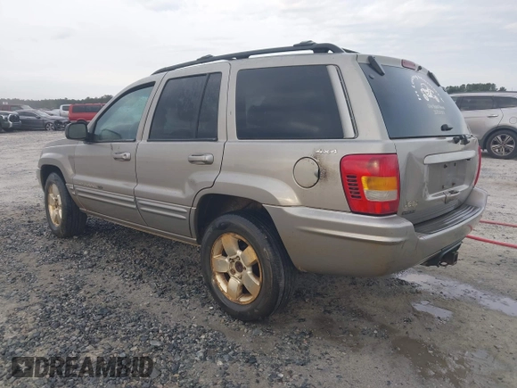 2001 Jeep Grand Cherokee Limited with VIN 1J4GW58N31C510766, listed as a IAAI auction lot 42107607 with 305,893 mi miles and . Bid and sale history available at DreamBid. Image 3.