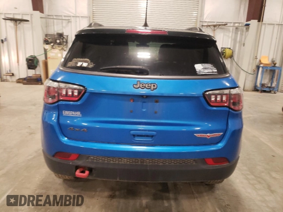 2018 Jeep Compass Trailhawk with VIN 3C4NJDDB3JT234532, listed as a Copart auction lot 55029605 with 99,614 mi miles and Salvage title. Bid and sale history available at DreamBid. Image 6.