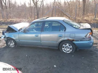 1999 Honda Civic EX with VIN 2HGEJ8643XH511334, listed as a IAAI auction lot 41851364 with 142,632 mi miles. Bid and sale history available at carsss.com. Image 14.