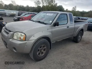 2004 Nissan Frontier XE Desert Runner with VIN 1N6ED26YX4C403794, listed as a Copart auction lot 74218974 with 101,495 mi miles and Clean title. Bid and sale history available at DreamBid. Image 1.
