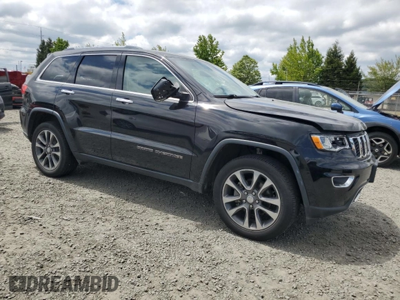 2018 Jeep Grand Cherokee Limited with VIN 1C4RJFBG8JC106374, listed as a Copart auction lot 58212965 with 61,813 mi miles and Salvage title. Bid and sale history available at DreamBid. Image 4.