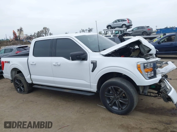 2022 Ford F-150 XL with VIN 1FTFW1E57NKE14424, listed as a IAAI auction lot 42097712 with 56,879 mi miles and . Bid and sale history available at DreamBid. Image 13.
