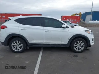 2020 Hyundai Tucson SE with VIN KM8J2CA41LU213551, listed as a IAAI auction lot 41393918 with 68,142 mi miles. Bid and sale history available at carsss.com. Image 14.