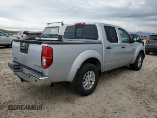 2018 Nissan Frontier Pro-4X with VIN 1N6AD0EV3JN730256, listed as a Copart auction lot 54273825 with 55,363 mi miles and Salvage title. Bid and sale history available at DreamBid. Image 3.