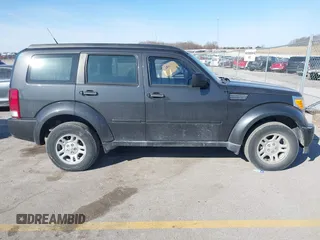 2011 Dodge Nitro SE z VIN 1D4PT2GK7BW520224, wystawiony jako IAAI lot #41781346 z przebiegiem 152 140 mil mil oraz . Historia ofert i sprzedaży dostępna na DreamBid. Obrazek 13.