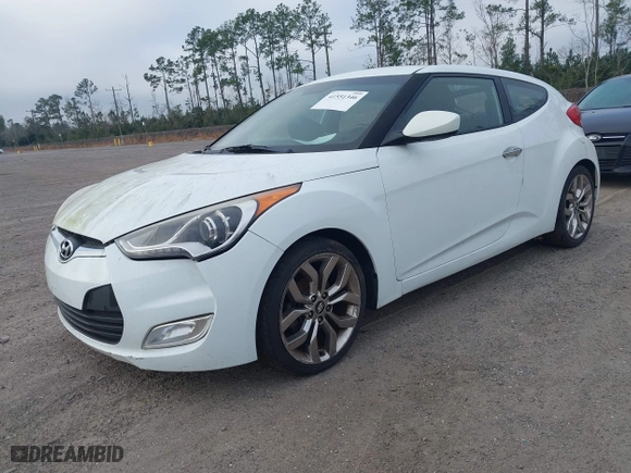 2014 Hyundai Veloster with VIN KMHTC6ADXEU213073, listed as a IAAI auction lot 41551346 with 130,549 mi miles. Bid and sale history available at carsss.com. Image 2.