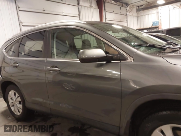 2014 Honda CR-V EX-L with VIN 5J6RM4H76EL043214, listed as a IAAI auction lot 41579664 with 124,681 mi miles. Bid and sale history available at carsss.com. Image 14.