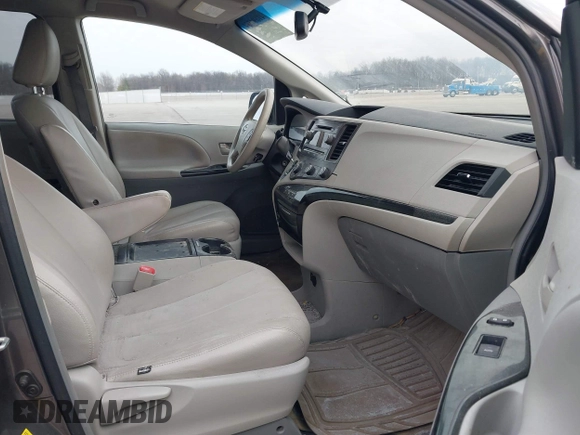 2012 Toyota Sienna LE AAS with VIN 5TDKK3DC0CS192952, listed as a IAAI auction lot 41694554 with 179,277 mi miles. Bid and sale history available at carsss.com. Image 5.