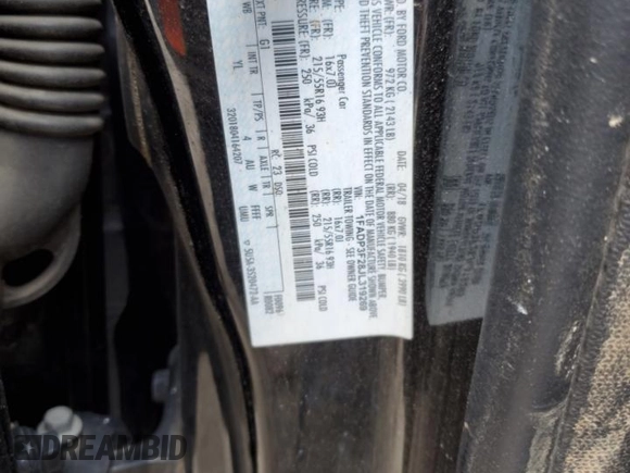 2018 Ford Focus SE z VIN 1FADP3F28JL319269, wystawiony jako Copart lot #59604555 z przebiegiem 167 726 mil mil oraz Szkoda całkowita • Salvage title. Historia ofert i sprzedaży dostępna na DreamBid. Obrazek 12.