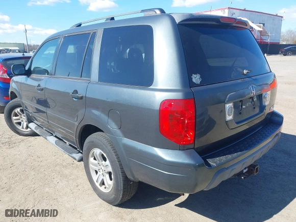2005 Honda Pilot EX-L with NAVI with VIN 2HKYF18705H559938, listed as a IAAI auction lot 41814487 with 188,665 mi miles. Bid and sale history available at carsss.com. Image 6.