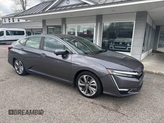 2018 Honda Clarity Plug-In Hybrid with VIN JHMZC5F13JC009933, listed as a IAAI auction lot 41888999 with 169,942 mi miles. Bid and sale history available at carsss.com. Image 1.