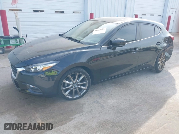2018 Mazda 3 Touring with VIN 3MZBN1L30JM247097, listed as a IAAI auction lot 41803062 with 61,345 mi miles. Bid and sale history available at carsss.com. Image 2.