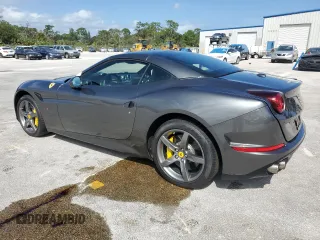 2015 Ferrari California T z VIN ZFF77XJA3F0206563, wystawiony jako Copart lot #73751534 z przebiegiem Nie podano mil oraz Szkody całkowita. Historia ofert i sprzedaży dostępna na DreamBid. Obrazek 2.