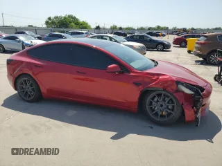 2021 Tesla Model 3 Standard Range Plus with VIN 5YJ3E1EA7MF915053, listed as a Copart auction lot 51172815 with 69,303 mi miles and Salvage Title. Bid and sale history available at DreamBid. Image 4.