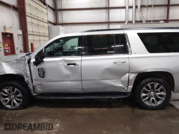2018 Chevrolet Suburban LT with VIN 1GNSKHKC7JR118799, listed as a IAAI auction lot 41708676 with 139,662 mi miles and . Bid and sale history available at DreamBid. Image 14.