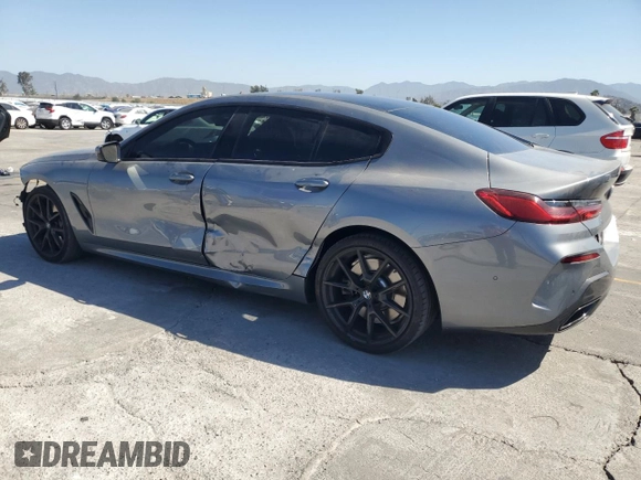 2024 BMW 8 Series 840i with VIN WBAGV2C08RCP97713, listed as a Copart auction lot 57355405 with 14,802 mi miles and Salvage title. Bid and sale history available at DreamBid. Image 2.