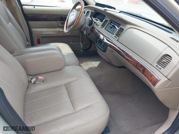 2004 Mercury Grand Marquis LS Premium with VIN 2MEFM75W14X649140, listed as a IAAI auction lot 42095663 with 88,896 mi miles. Bid and sale history available at carsss.com. Image 5.