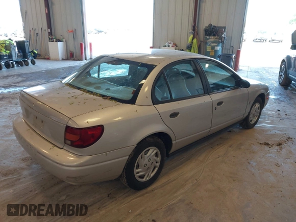 2001 Saturn SL z VIN 1G8ZF52841Z208220, wystawiony jako IAAI lot #42288195 z przebiegiem Nie podano mil oraz . Historia ofert i sprzedaży dostępna na DreamBid. Obrazek 4.