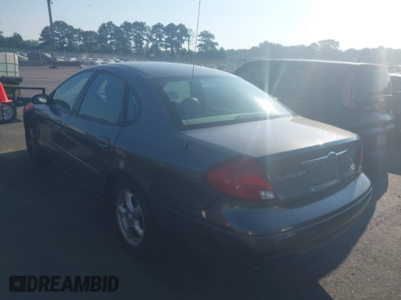 2002 Ford Taurus SES Standard z VIN 1FAFP55U22A172533, wystawiony jako IAAI lot #42680611 z przebiegiem 122 306 mil mil oraz . Historia ofert i sprzedaży dostępna na DreamBid. Obrazek 3.
