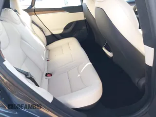 2023 Tesla Model S with VIN 5YJSA1E5XPF500341, listed as a IAAI auction lot 40756406 with 11,583 mi miles and . Bid and sale history available at DreamBid. Image 8.