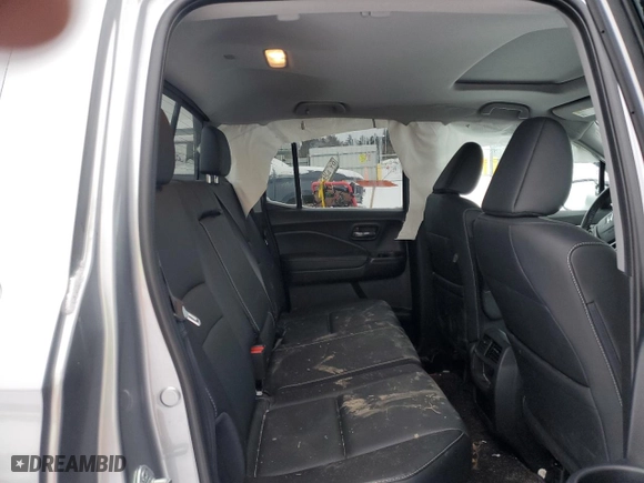 2021 Honda Ridgeline RTL-E with VIN 5FPYK3F74MB021063, listed as a Copart auction lot 47047435 with 31,884 mi miles and Salvage Title. Bid and sale history available at carsss.com. Image 10.