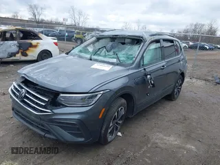 2024 Volkswagen Tiguan S with VIN 3VVFB7AX5RM188177, listed as a IAAI auction lot 41865699 with 7,823 mi miles and . Bid and sale history available at DreamBid. Image 2.