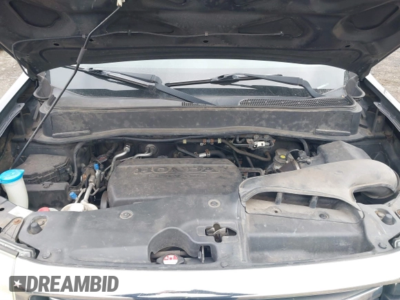 2013 Honda Pilot EX-L with VIN 5FNYF4H71DB021487, listed as a IAAI auction lot 41272308 with 188,217 mi miles and . Bid and sale history available at DreamBid. Image 10.