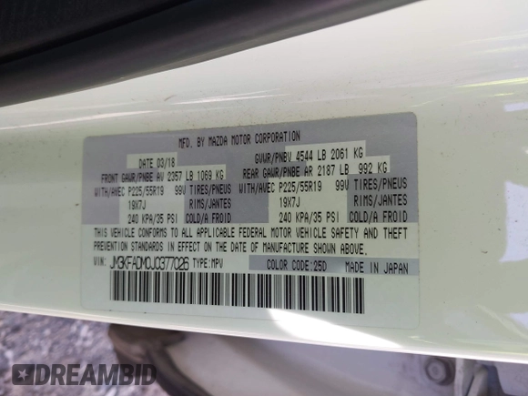 2018 Mazda CX-5 Grand Touring with VIN JM3KFADM0J0377026, listed as a IAAI auction lot 41649686 with 100,901 mi miles and . Bid and sale history available at DreamBid. Image 9.