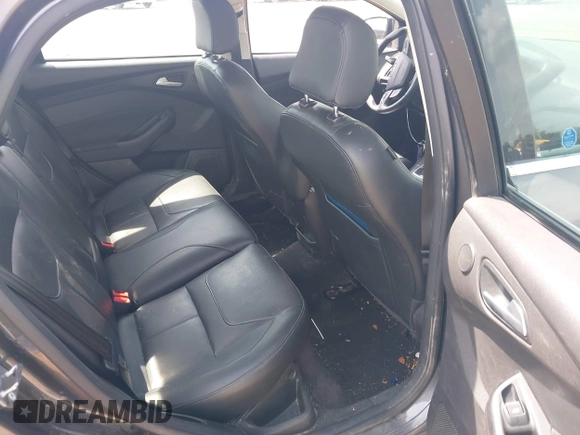 2017 Ford Focus Titanium with VIN 1FADP3J27HL306546, listed as a IAAI auction lot 42480576 with 114,285 mi miles and . Bid and sale history available at DreamBid. Image 8.