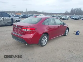 2023 Toyota Corolla Hybrid LE with VIN JTDBCMFE2PJ003738, listed as a IAAI auction lot 41620152 with 4,926 mi miles. Bid and sale history available at carsss.com. Image 4.