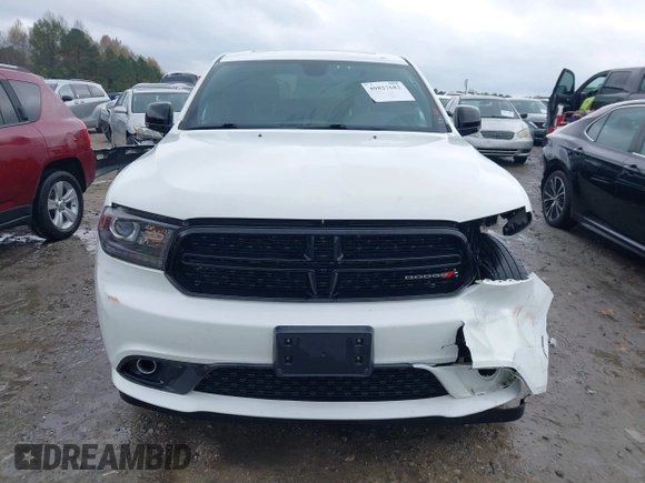 2015 Dodge Durango Limited with VIN 1C4RDJDG2FC858120, listed as a IAAI auction lot 40827682 with 130,862 mi miles and . Bid and sale history available at DreamBid. Image 12.