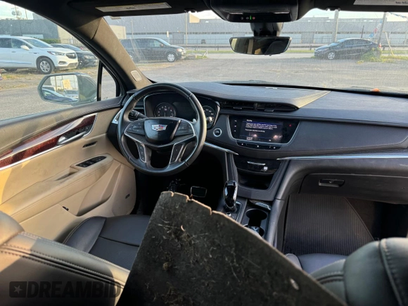 2021 Cadillac XT5 AWD Sport z VIN 1GYKNGRS9MZ200684, wystawiony jako Copart lot #78047424 z przebiegiem 2 713 mil mil oraz Czysty tytuł • Clean title. Historia ofert i sprzedaży dostępna na DreamBid. Obrazek 9.