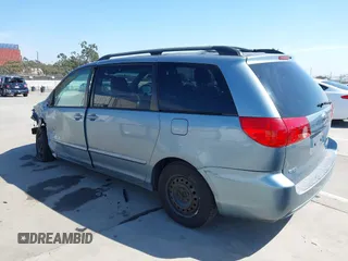 2010 Toyota Sienna CE with VIN 5TDKK4CCXAS332266, listed as a IAAI auction lot 41809577 with 217,051 mi miles. Bid and sale history available at carsss.com. Image 3.