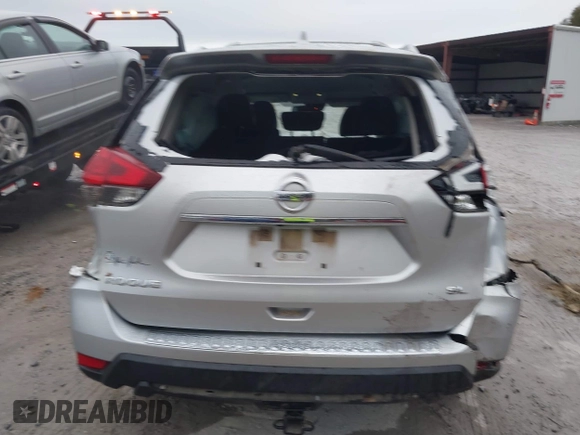 2017 Nissan Rogue SV with VIN JN8AT2MT7HW143178, listed as a IAAI auction lot 41015343 with 139,828 mi miles and . Bid and sale history available at DreamBid. Image 17.