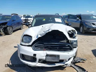 2018 MINI Countryman Cooper with VIN WMZYV5C37J3E03421, listed as a IAAI auction lot 42238016 with 93,810 mi miles and . Bid and sale history available at DreamBid. Image 12.