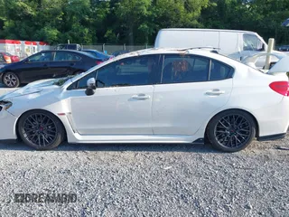 2015 Subaru WRX STI z VIN JF1VA2P65F9824661, wystawiony jako IAAI lot #42623315 z przebiegiem 69 103 mil mil oraz . Historia ofert i sprzedaży dostępna na DreamBid. Obrazek 14.