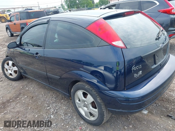 2003 Ford Focus ZX3 with VIN 3FAFP31313R104703, listed as a IAAI auction lot 42487996 with 91,526 mi miles and . Bid and sale history available at DreamBid. Image 3.