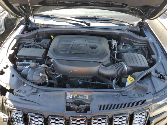 2022 Jeep Grand Cherokee WK Laredo E with VIN 1C4RJFAG4NC148340, listed as a Copart auction lot 62685594 with 59,743 mi miles and Salvage Title. Bid and sale history available at carsss.com. Image 12.