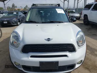 2013 MINI Countryman S with VIN WMWZC3C55DWP24628, listed as a IAAI auction lot 42558387 with 169,269 mi miles and . Bid and sale history available at DreamBid. Image 12.