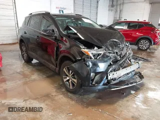 2018 Toyota RAV4 XLE with VIN 2T3WFREV1JW471931, listed as a IAAI auction lot 41332851 with 123,657 mi miles. Bid and sale history available at carsss.com. Image 1.