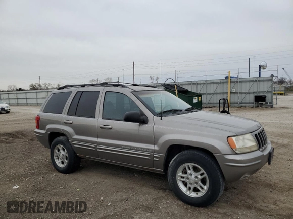1999 Jeep Grand Cherokee Limited with VIN 1J4GW68SXXC582343, listed as a Copart auction lot 51067695 with 157,456 mi miles and Clean Title. Bid and sale history available at carsss.com. Image 4.
