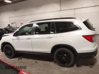 2022 Honda Pilot Special Edition with VIN 5FNYF6H27NB105041, listed as a IAAI auction lot 41916708 with 15,848 mi miles and . Bid and sale history available at DreamBid. Image 15.